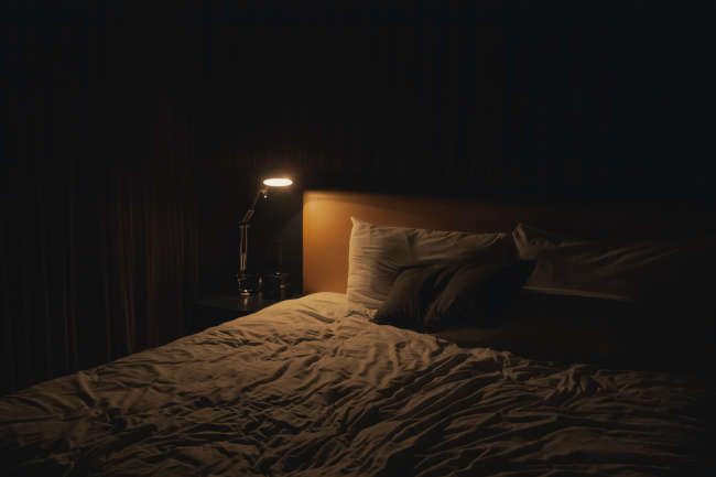 empty bed in the middle of the night