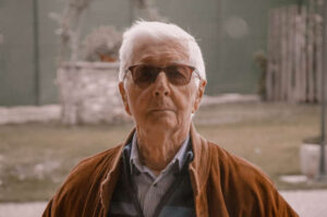 elderly man wearing glasses