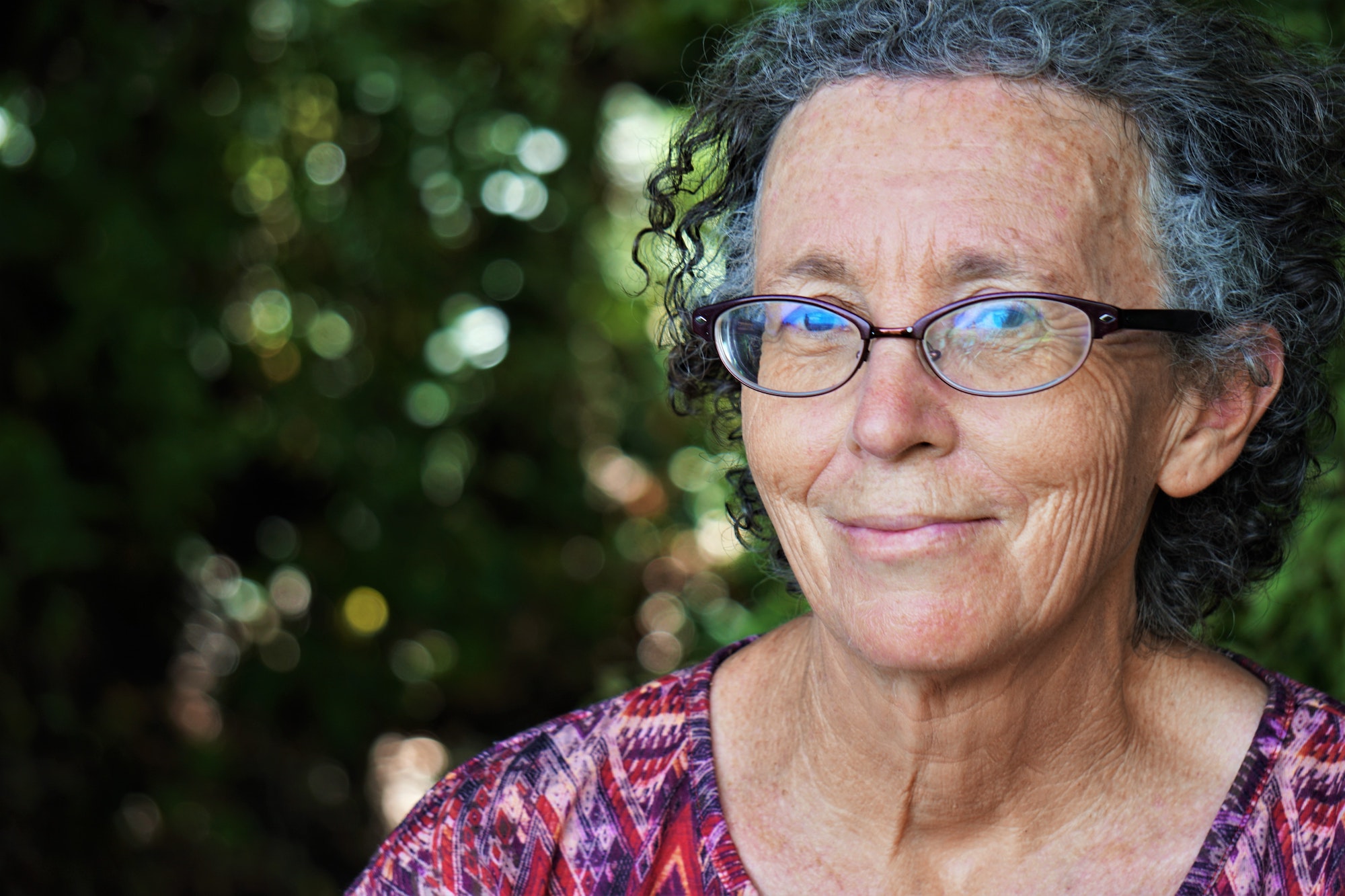 elderly-woman-with-glasses-smiling
